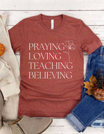 PRE-ORDER 'Praying Loving Teaching Believing' T-Shirt